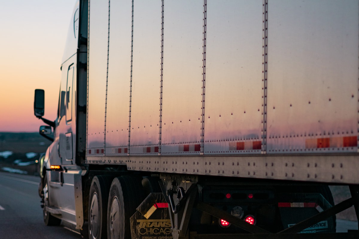 Professional semi-truck driver hauling freight on a regional route